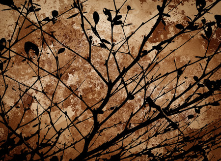 silhouette branch tree on grunge brown backgroundの写真素材