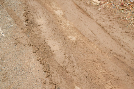 wheel track on dirt soil textureの写真素材