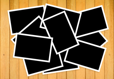 photo frame on wood backgroundの写真素材