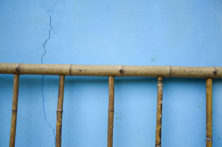 wooden fence on cement wallの写真素材