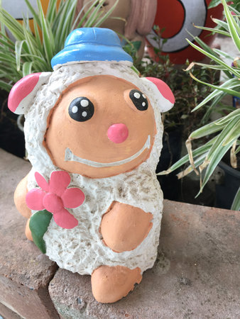 sheep statue in garden