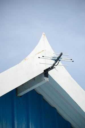 small antenna on roof homeの写真素材