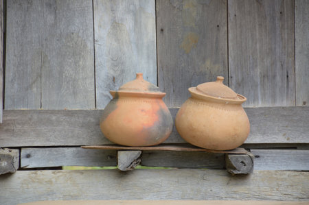 close up clay pot in country home at Thailandの写真素材