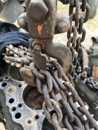 close up old reel on iron pole