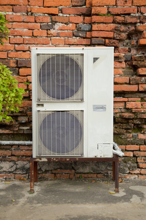 close up air conditioner on cement floorの写真素材