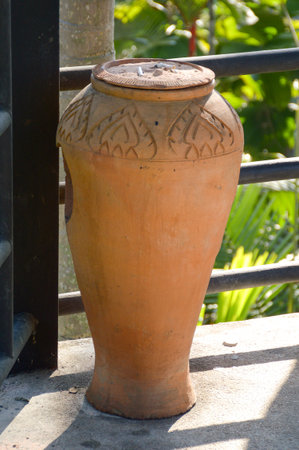 clay pot bin in garden