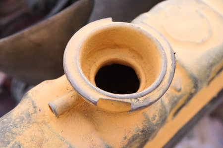 close up old radiator cap under the hood of the carの写真素材
