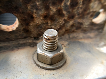 close up old nut on metalの写真素材