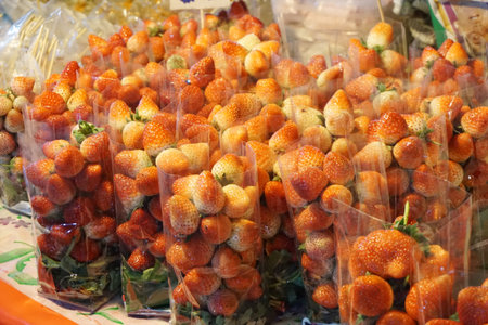 red fresh Strawberry in night marketの写真素材