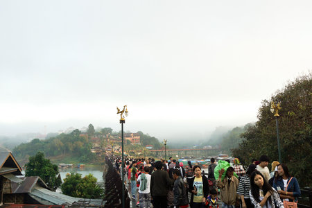 5 January 2017 : tourists on wooden Mon Bridge, Sangkhla Buri, Kanchanaburi, Thailandのeditorial素材