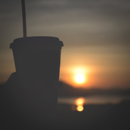 plastic glass in sunset