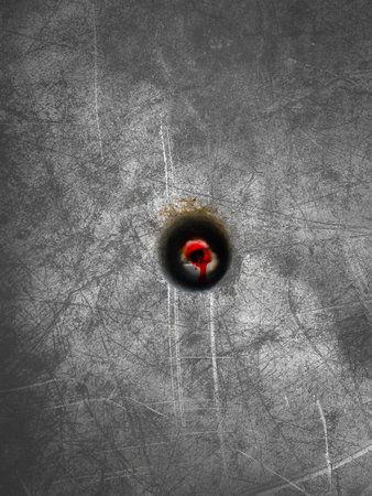 close up eye in hole on old cement wallの写真素材