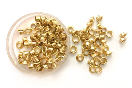 brass eyelets on white backgroundの写真素材