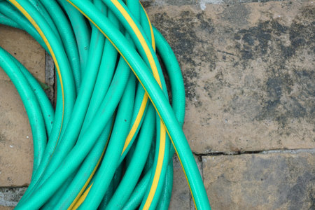 green rubber band on cement floorの写真素材