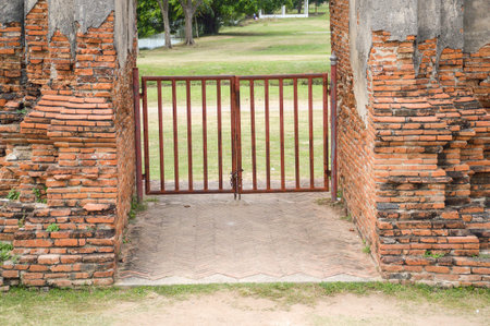 old iron gate in temple Thailandの写真素材