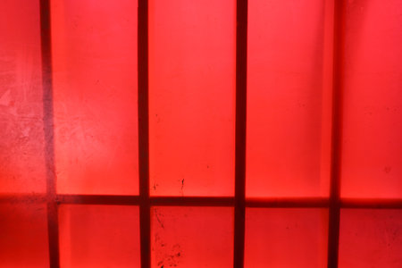 red plastic fabric on wood wall textureの写真素材