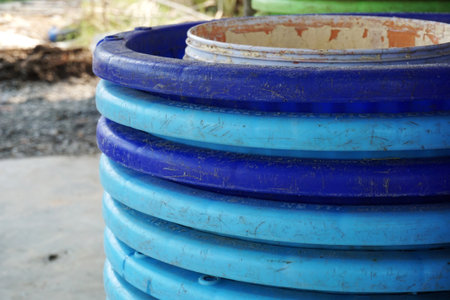 close up blue plastic basket in country farmの写真素材