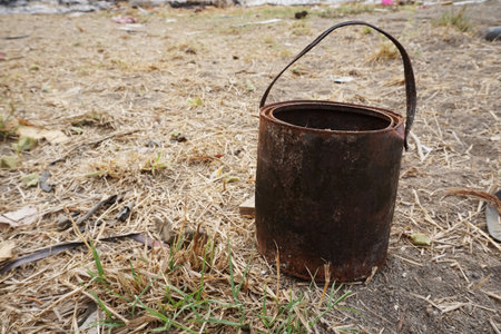 close up rusty can on the groundの写真素材