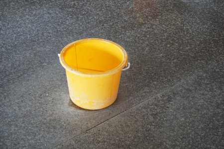 plastic bucket on the floor