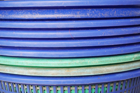 close up blue plastic basket in country farmの写真素材