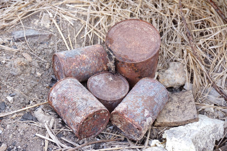 close up old rusty can on the groundの写真素材