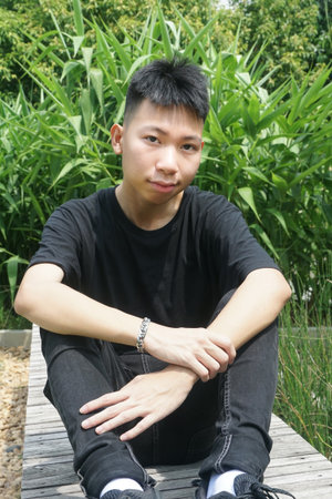 close up young man in nature garden