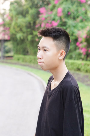 close up young man in nature gardenの写真素材