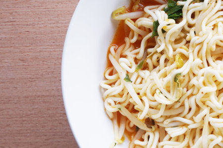 dry tomyum noodle on wooden tableの写真素材