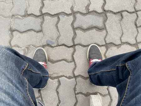 close up man leg on the road