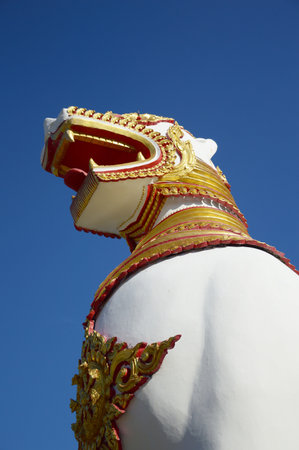 Singha, Lion Statue in front of mon temple in Sangkraburi, Kanchanaburi, Thailandの写真素材