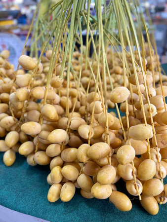 fresh ripe palm fruit on the market
