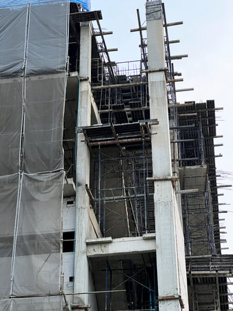 construction site with scaffolding and concrete