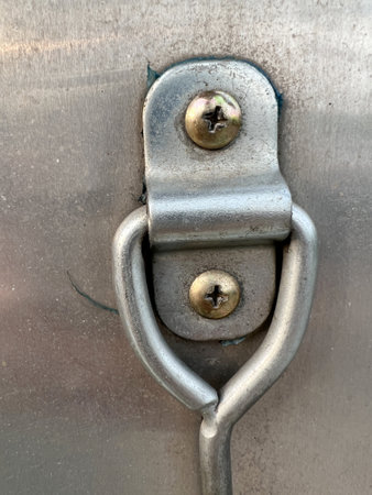 close up of metal door lock of car