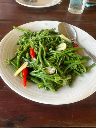Burmese (Southeast Asian) Style Fried Ivy Gourd Leaves Recipeの写真素材