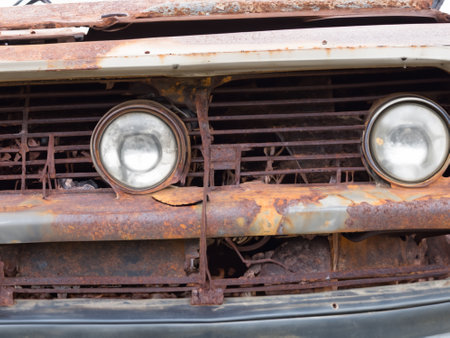 car headlight on the old abandoned carの素材