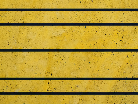 abstract background of yellow brick wallの写真素材