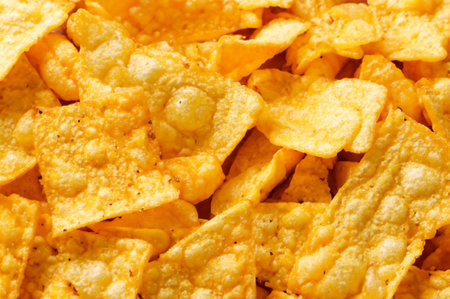 fried corn chips on white backgroundの素材