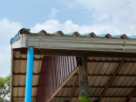 old metal roof with blue sky.