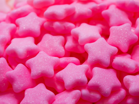 pink stars candies background, close upの素材