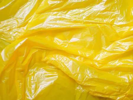 close up yellow plastic texture backgroundの素材