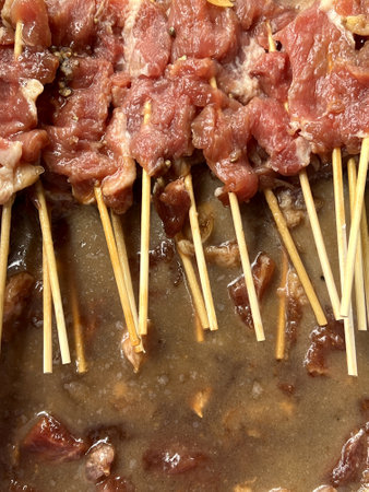 close up view of delicious asian food, pork skewerの写真素材