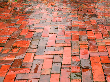 wet brick surface with rain drops on itの素材