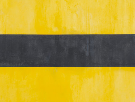 yellow painted cement wall backgroundの素材