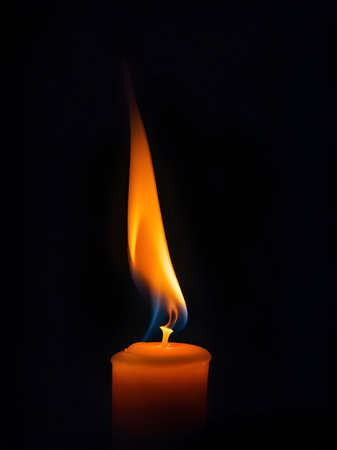 candles in the dark, flame of a candle burning in the darkの素材