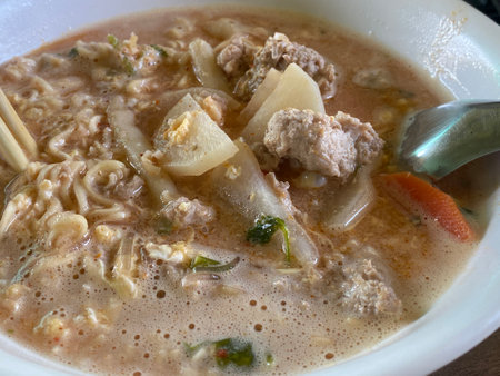close up view of delicious asian cuisine, red pork noodle