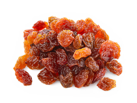 heap of red raisins isolated on white backgroundの素材