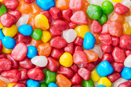 Colorful candy shaped baubles, full background.の素材