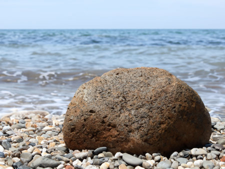 sea stones and waves in a beachの素材