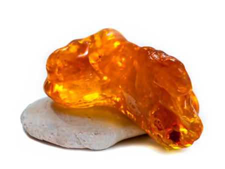 amber mineral stone on white backgroundの素材