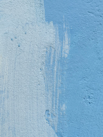 painted white and blue wall backgroundの写真素材